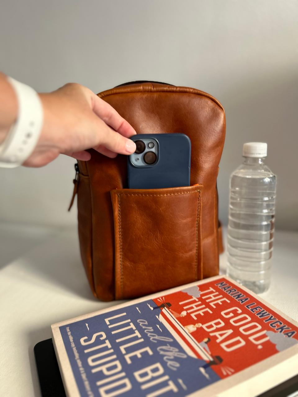 The Max Sling in toffee leather