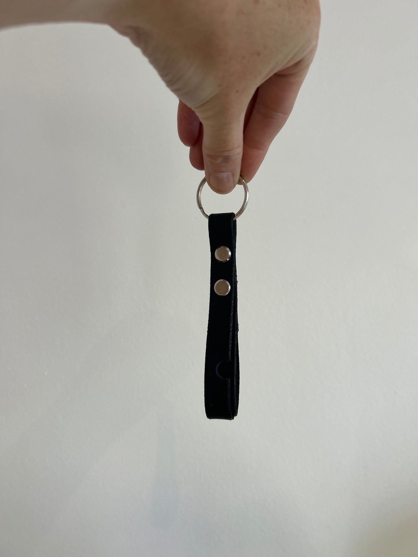 Leather keyring loop. Can be used to prop up a cell phone for making video calls/watching videos