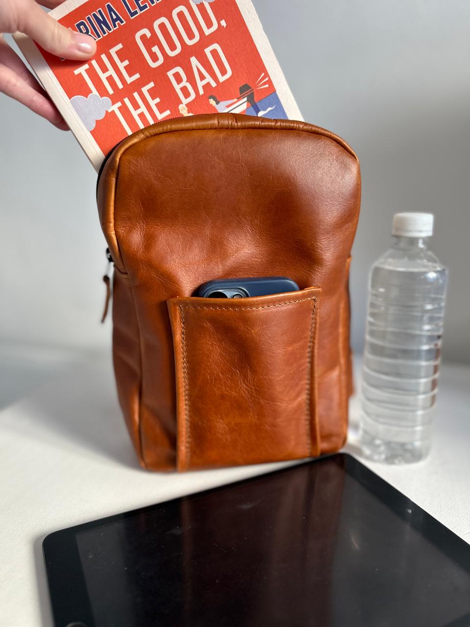 The Max Sling in toffee leather