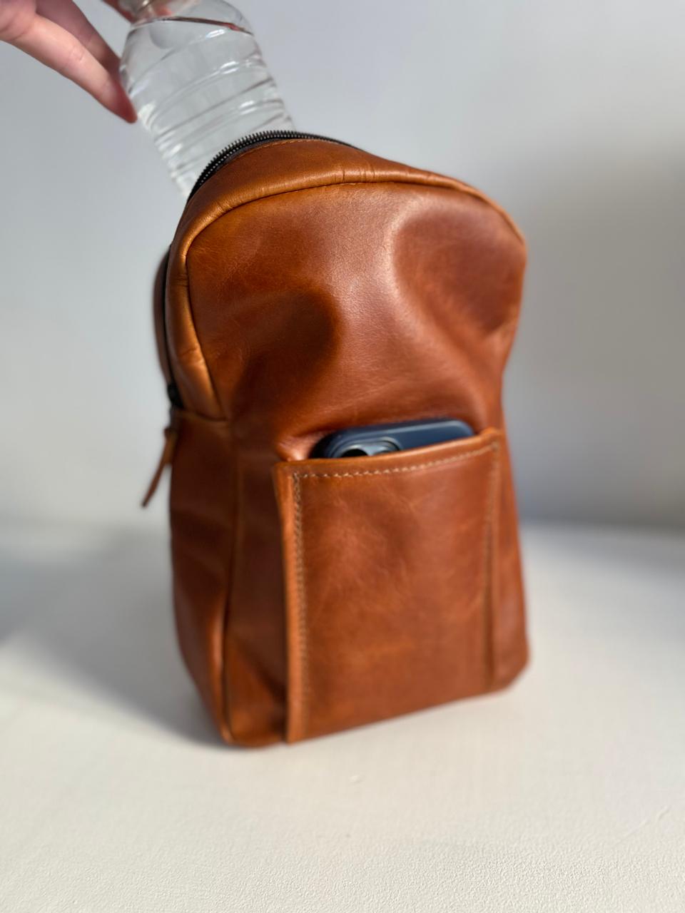 The Max Sling in toffee leather