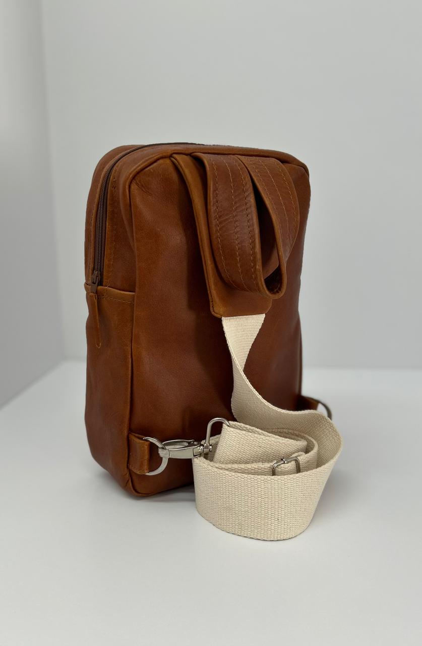 The Max Sling in toffee leather