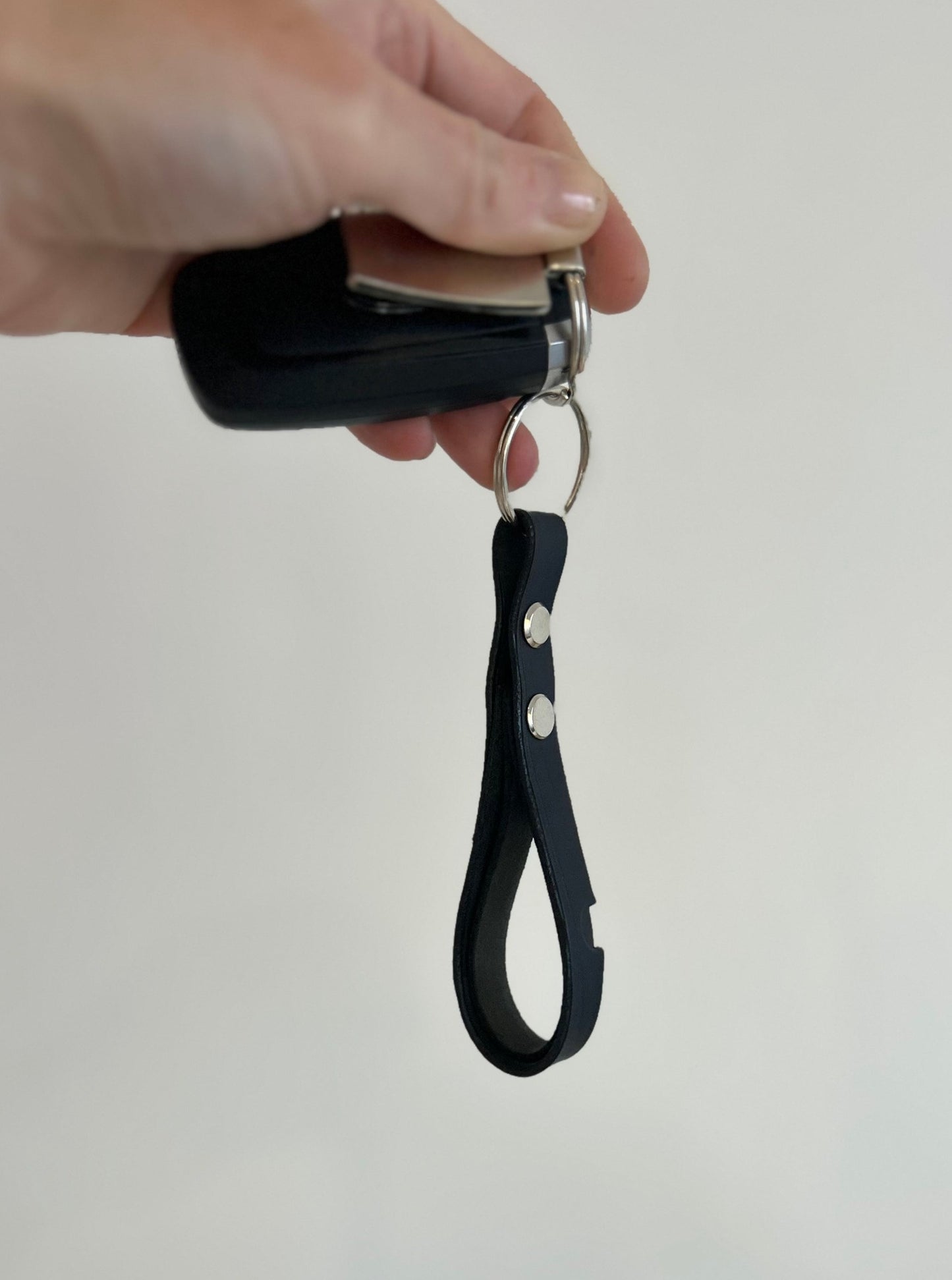 Leather key ring.  Loop at end so can be held easily